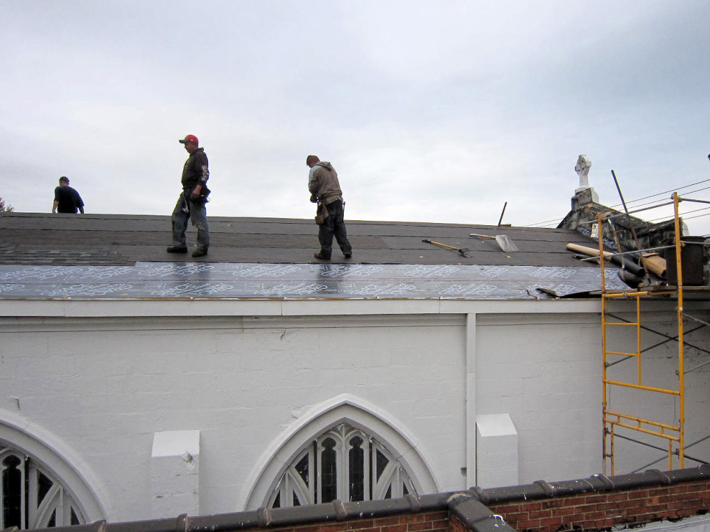 The Reader Roofing crew installing the new roofing system on a church in Cleveland.